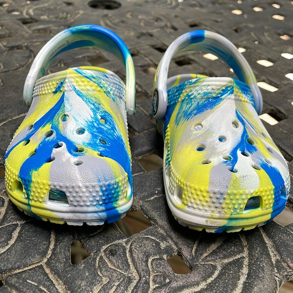 CROCS Toddler Size 5.  Brand new.  Never worn.  Marbled Blue/Yelllow/White
